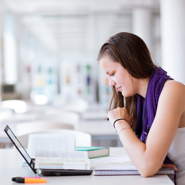 College girl on her laptop